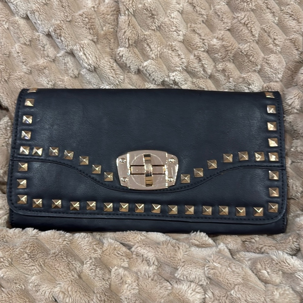 Urban Expression studded clutch. Black and gold